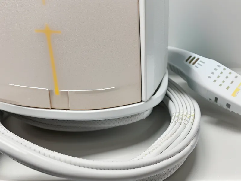 Ethernet cable plugging into a fiber internet wall outlet