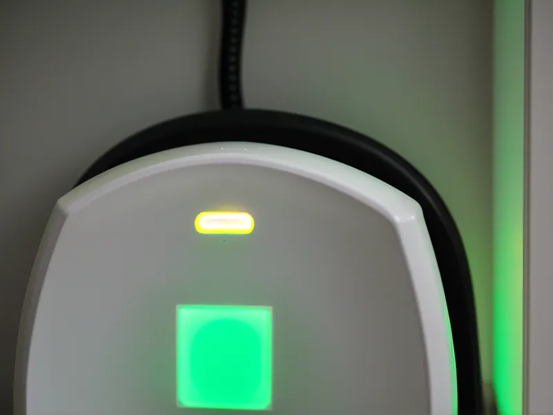 Close-up of an ethernet cable plugged into a home internet modem.